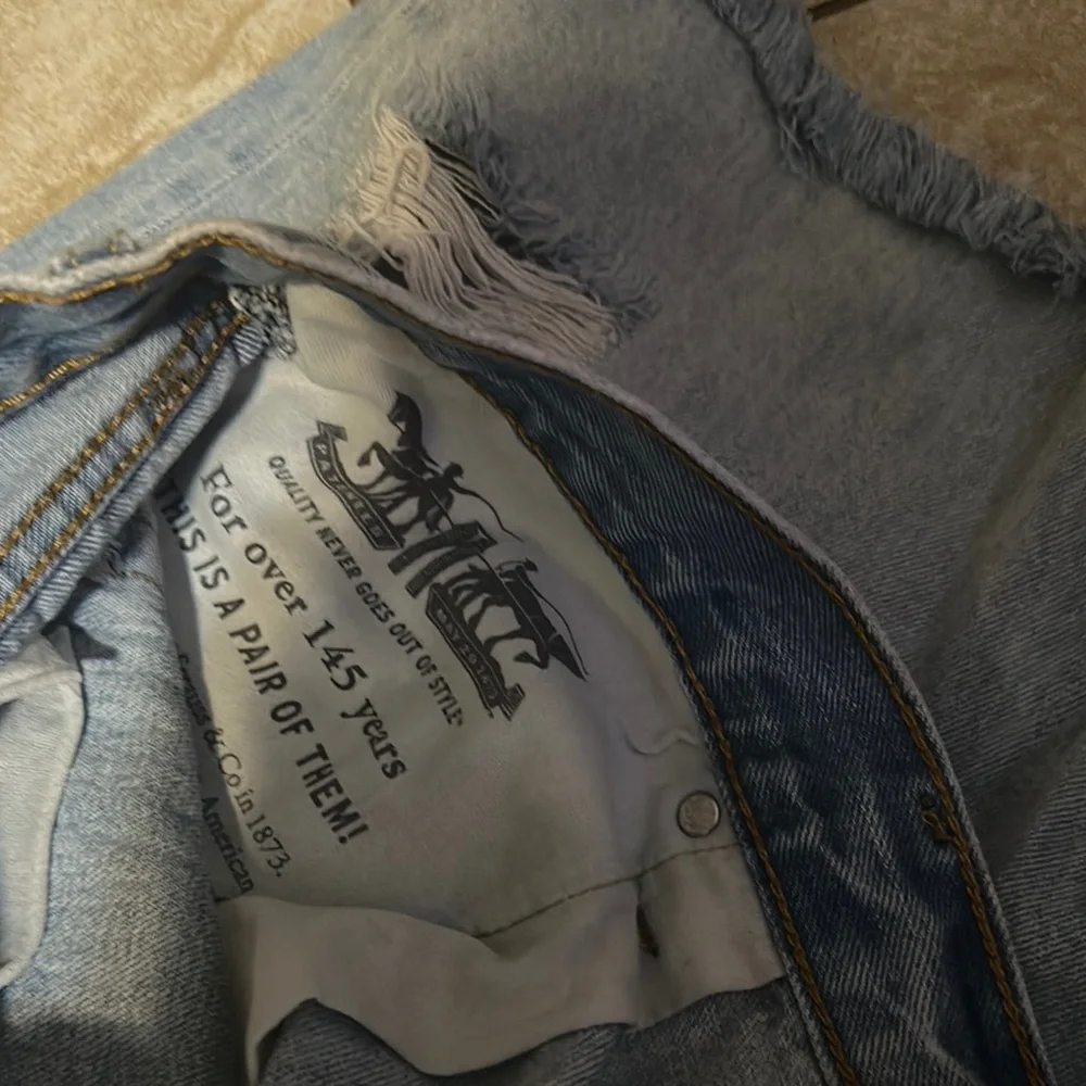 Levi’s Ripped Denim Shorts - Picture 6 of 6